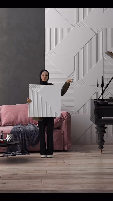 Diverse composizioni geometriche sulla parete mostrate mentre si tiene un campione di pannello