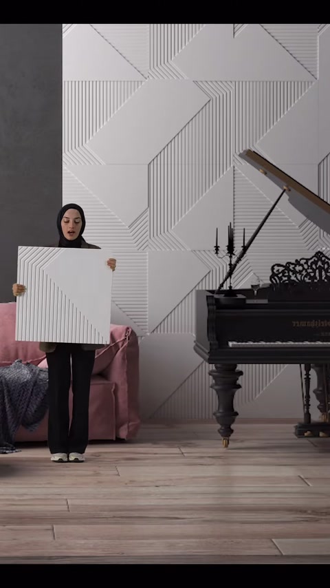 Un campione di pannello decorativo mostrato insieme a una composizione di parete realizzata