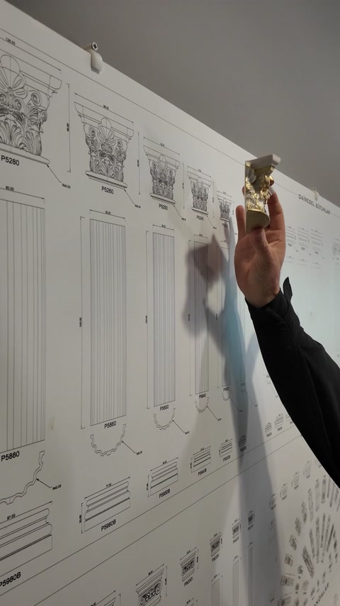 Ornamental capital sample is compared against the product library drawing