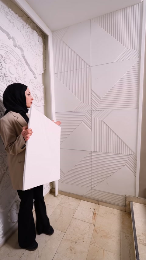 Flat rear surface of panel displayed alongside wall application