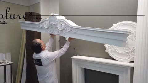 A relief pediment motif is carefully applied to a horizontal profile