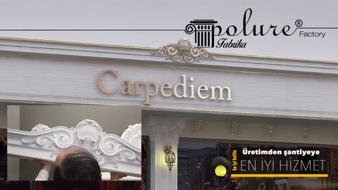 A wide facade moulding and decorative door surround are visible at the store entrance