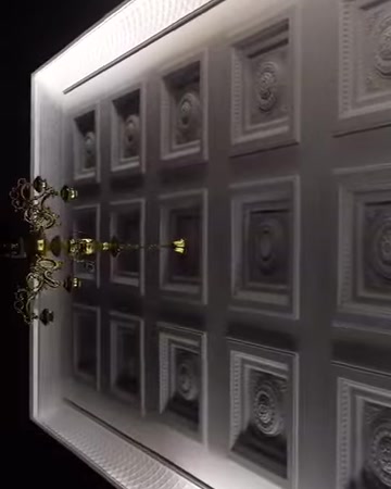 A close-up view of the dome depths and molding transitions in the ceiling composition