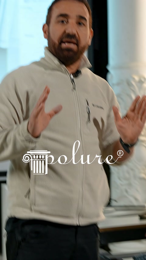 Craftsman demonstrates the application stages using hand gestures in the workshop