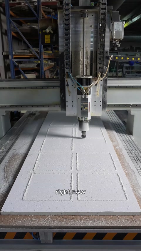 The complete form of the arched window emerges on the machined panel