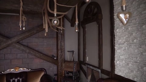 Beam and arch decoration in a rustic space with stone walls