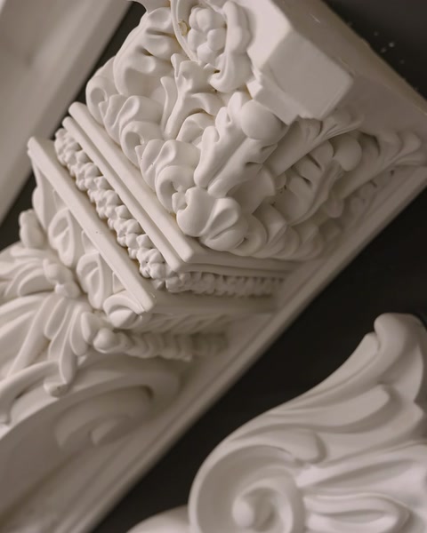 Close-up ornate corbel bracket with acanthus leaf carving detail