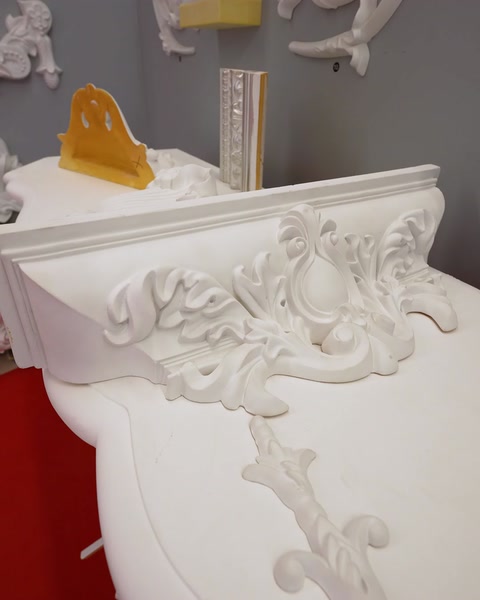 Decorative corbel and cornice piece with yellow production tag attached