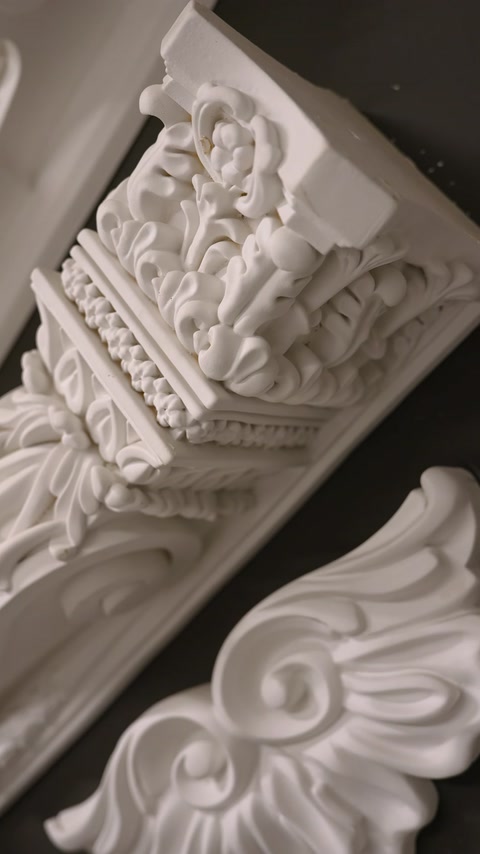 Close-up ornate corbel bracket with acanthus leaf carving detail