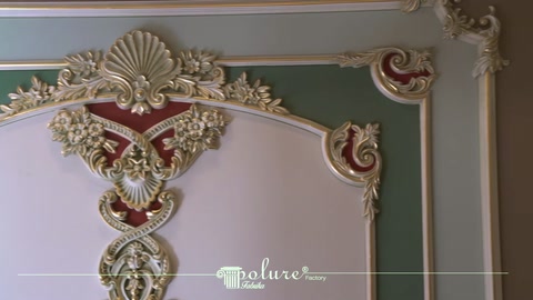 Upper frame connection between ornate crown molding and rebated trim examined closely