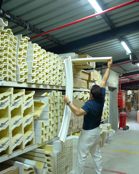 Flexible flex arch profile is bent by hand to demonstrate flexibility