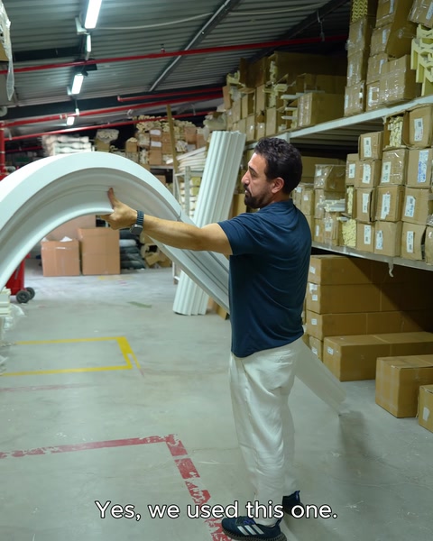 Circular arch profile is held against the wall and presented