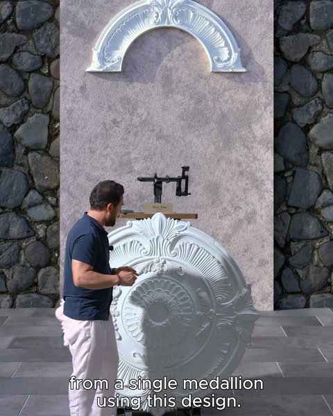 The arch piece cut from a single medallion is placed on the wall