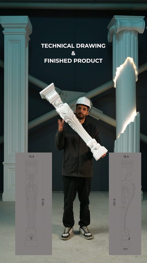 This video shows a craftsman examining a long fluted pilaster ornament in front of drawing boards.