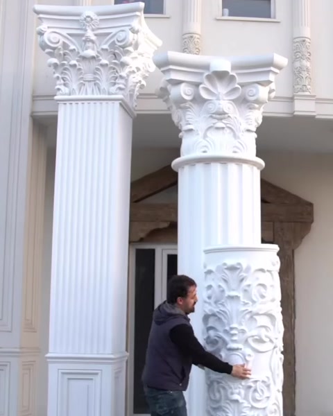 Close view of two columns with detailed capitals.