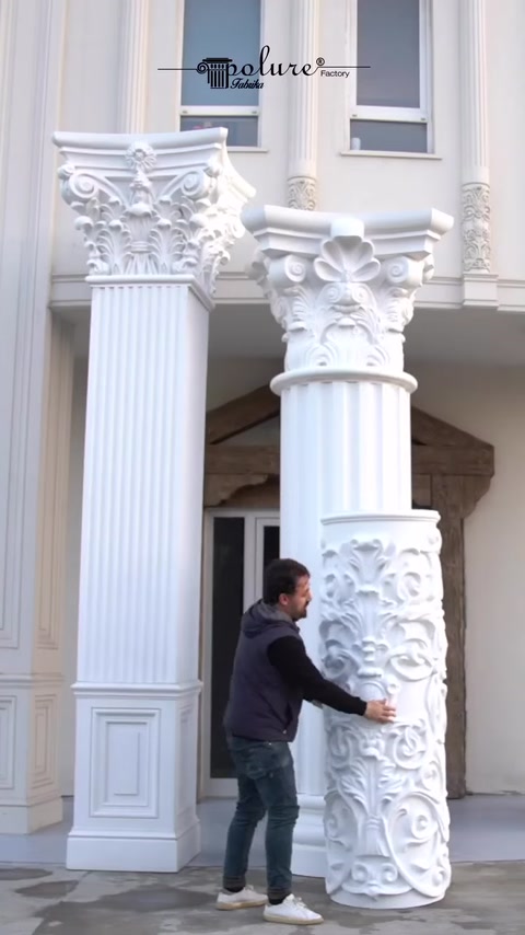 Close view of two columns with detailed capitals.
