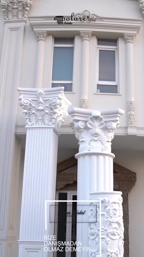 Close-up of capital ornamentation atop finished column.