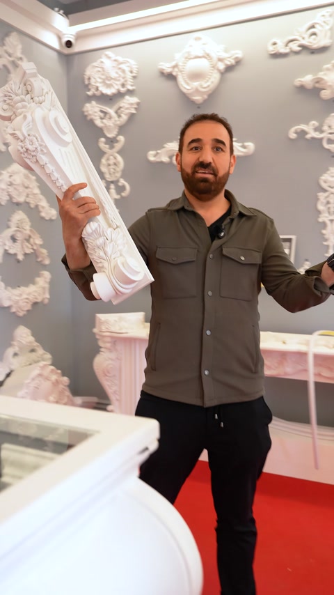 Two white corbels in different sizes compared side by side
