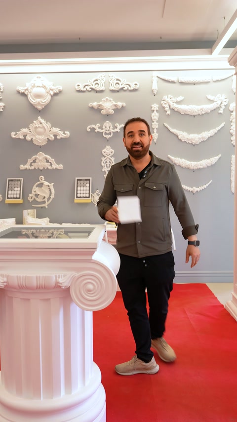 Server carries two baluster examples in a columned showroom area