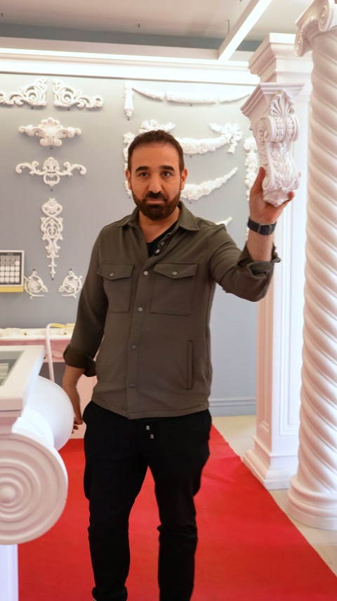 Profiled body of decorative baluster is highlighted in showroom setting