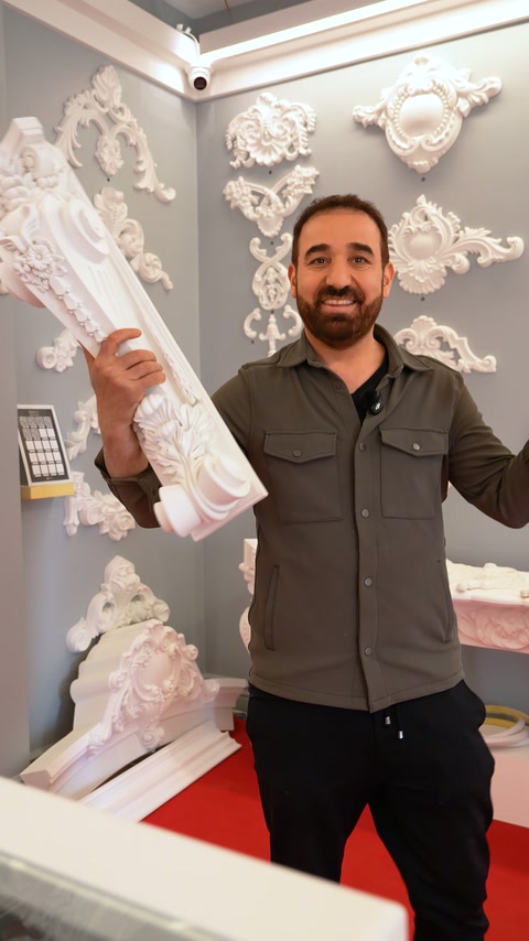 Long decorative baluster is presented horizontally to viewers in showroom