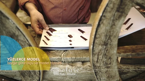 Finger points to wood-textured profile options arranged on the catalog.