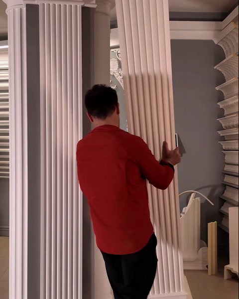 Close side view of fluted pilaster shaft and its base block