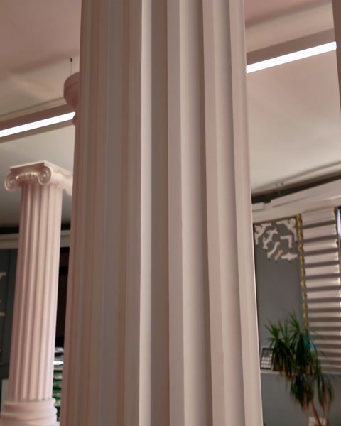 Two column halves joined face to face to form a full shaft