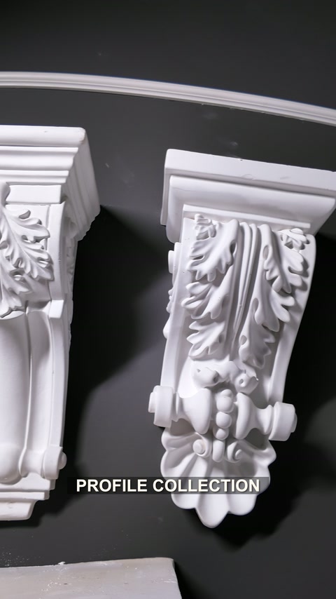 Classical corbels featuring leaf scroll and grape relief details