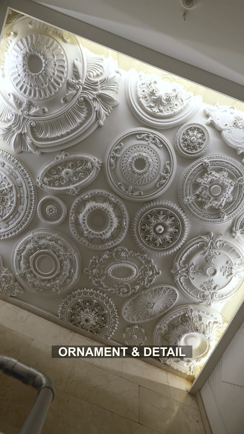 Circular ceiling medallions with floral and geometric relief patterns