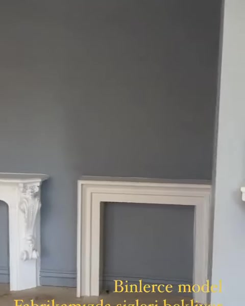 Dekoratif şömine çevresi ile farklı ölçekte çerçeve profilleri sergileniyor.