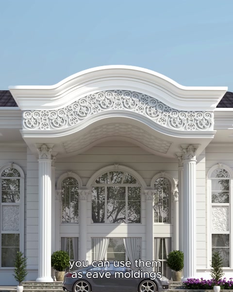 Frontone curvo, cornicione ornamentale e colonne che completano il design.