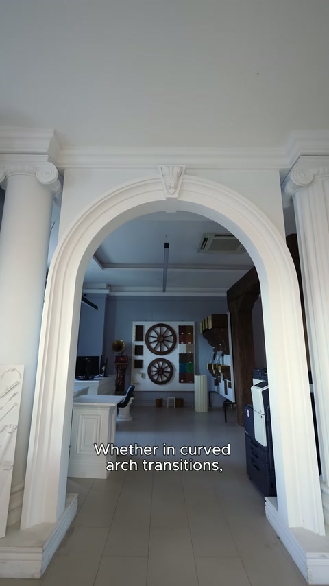 Round arch surrounding profile application visible at white interior entrance.