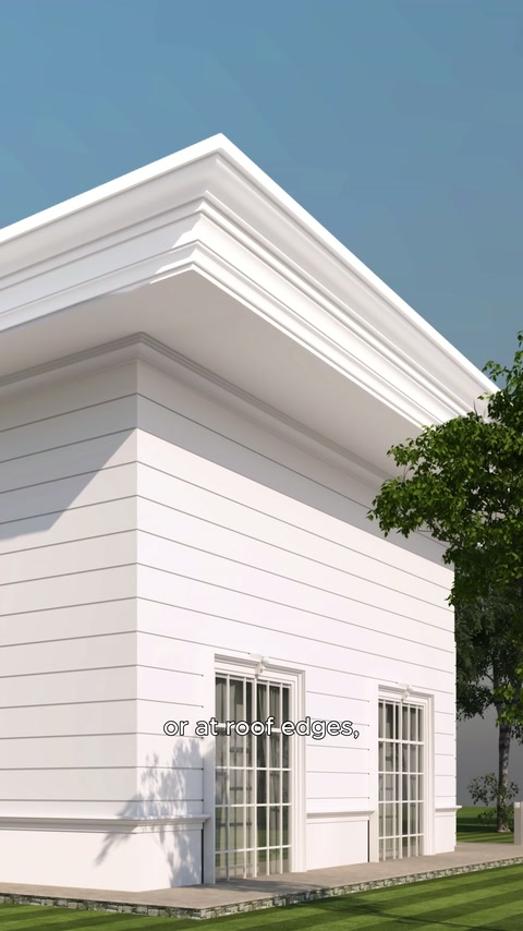 Layered white soffit profiles applied at the roof edge of a modern building.