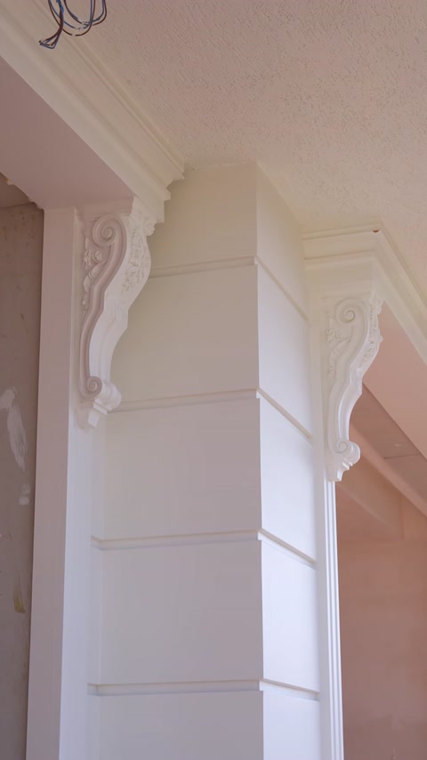 Ornamental corbel detail used beneath the soffit