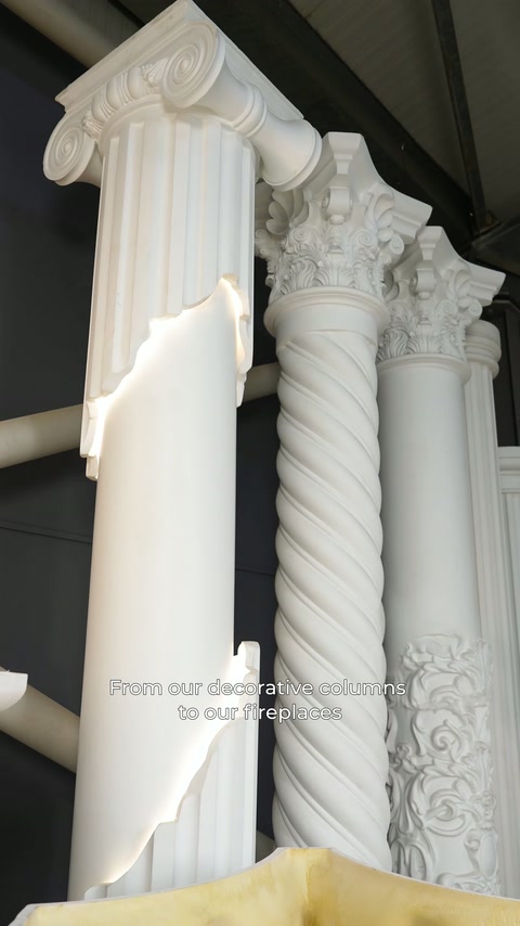 Ionic and foliated capitals are displayed together with spiral-fluted column shafts.