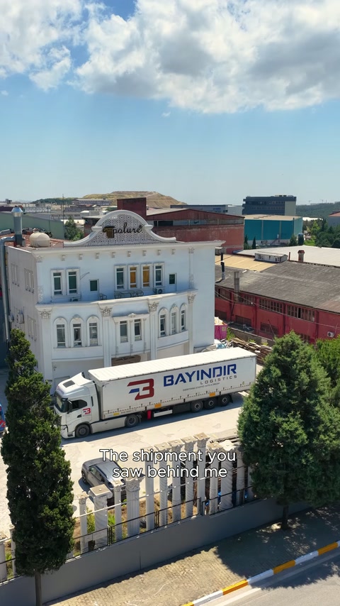 An aerial shot shows the facility, the truck and the surrounding buildings.