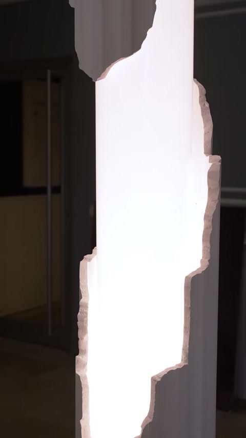 Close-up of polyurethane column cladding with bright LED edge glow