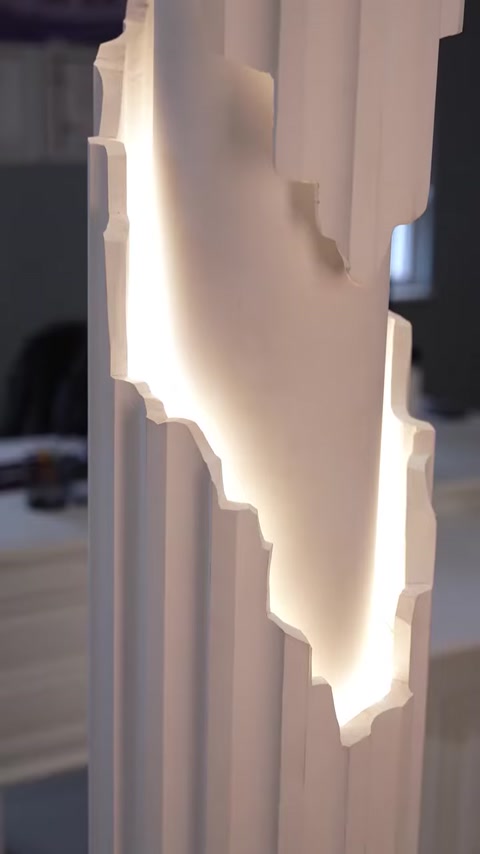 Close-up vertical column panel with hidden LED strip lighting