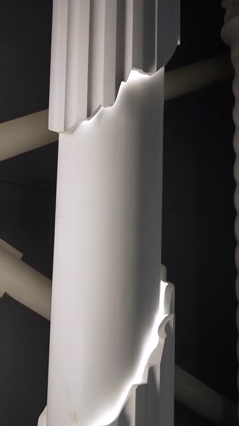 Cylindrical polyurethane column edge lit by integrated LED strip