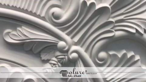 Kabartmalı yaprak desenleriyle detaylandırılmış tavan göbeği