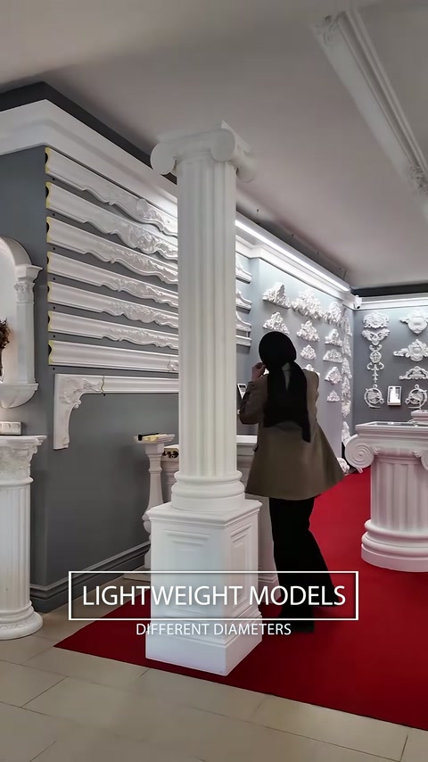 Fluted column and layered moulding profiles displayed inside the showroom.