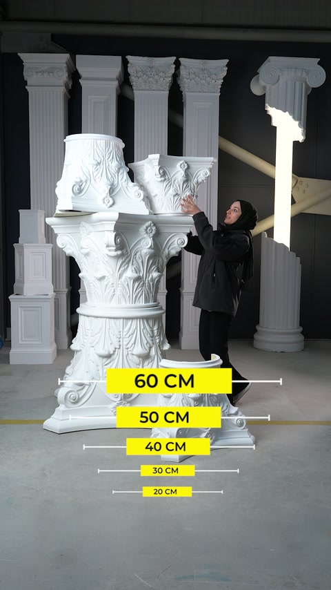 Multiple ornate Corinthian capitals displayed with varied diameter references.