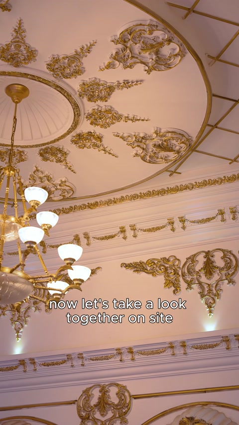 Ceiling cornice detail with layered gold molding trim