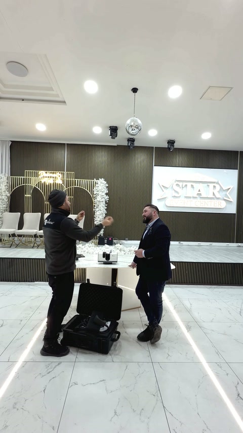Project representatives discussing the hall survey and decorative redesign