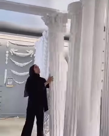A collection of columns with different shaft shapes is seen from a distance