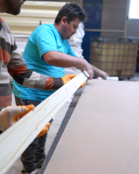 Attaching a polyurethane molding strip along the tabletop edge