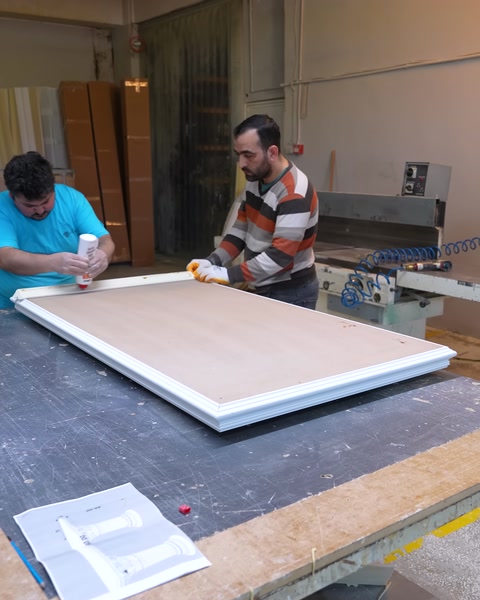 Fitting a polyurethane decorative trim onto the tabletop panel