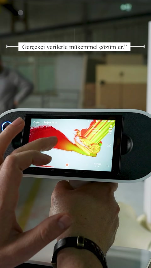 Tablet displays a colorful digital architectural design visualization