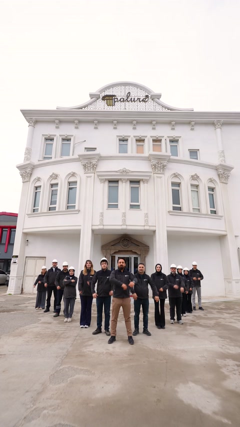 Completed exterior facade showcases classical columns and decorative mouldings